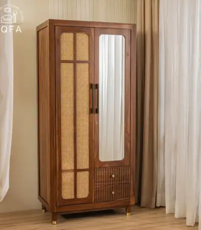 Rida Sheesham Wood Wardrobe in Teak Finish featuring artisanal cane-accented doors and an integrated full-length mirror.