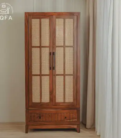 Saanvi Sheesham Wood Wardrobe in Teak Finish featuring premium solid wood construction and artisanal cane accented doors