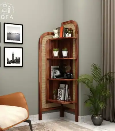 Tarika Sheesham Wood Corner Book Shelf, Tarika Sheesham wood and cane 4 tier corner book shelf in honey finish styled with books and decor.